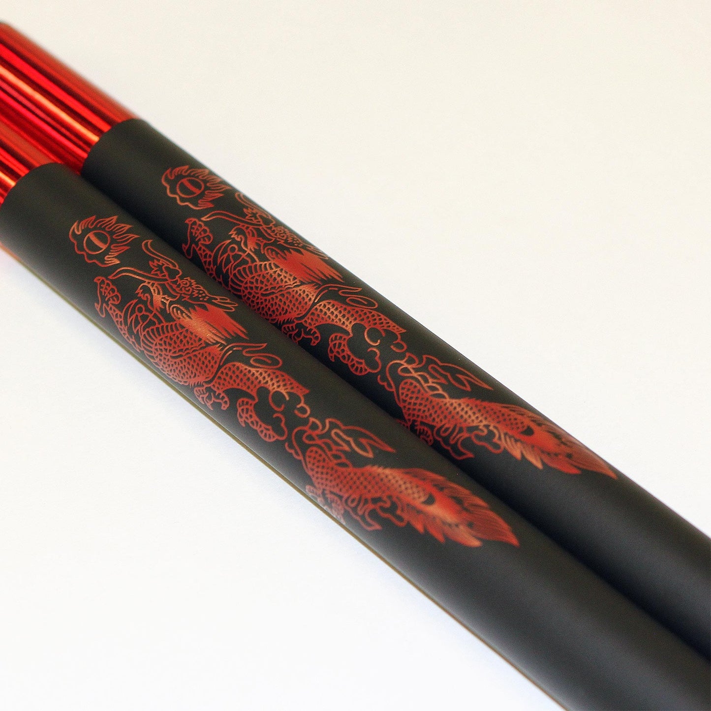 Demo III Black Practice Foam Nunchaku with Red Dragon